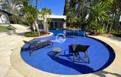 Imagem: A casa em condomínio possui 4 Dormitórios, 5 Banheiros, 5