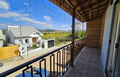 Imagem 5: Casa à Venda. Churrasqueira, Varanda, 150m² de Áreae2 Vagas na garagem