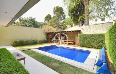 Imagem: A casa em condomínio possui 4 Dormitórios, 5 Banheiros, 4