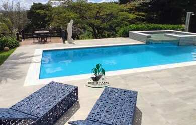 Imagem: A casa em condomínio possui 5 Dormitórios, 5 Banheiros, 5