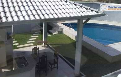 Imagem: A casa possui 3 Dormitórios, 5 Banheiros, 4 Vagas na garagem