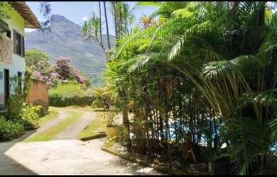 Imagem: A casa em condomínio possui 5 Dormitórios, 5 Banheiros, 5