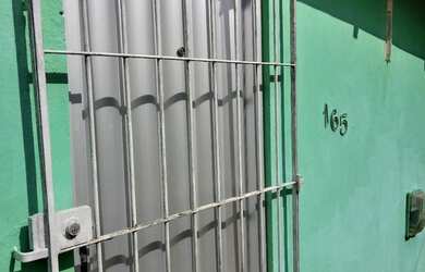 Imagem: A casa possui 2 Dormitórios e 1 Banheiro e está localizado