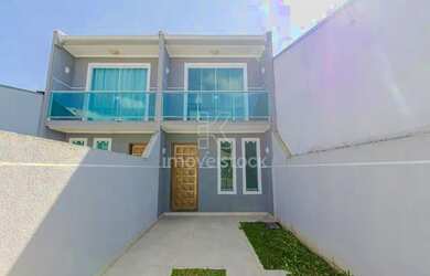 Imagem: A casa possui 2 Dormitórios, 2 Banheiros, 2 Vagas na garagem