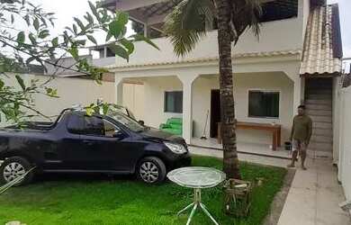 Imagem: A casa possui 2 Dormitórios, 5 Vagas na garagem e está localizado