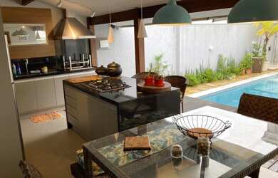 Imagem: A casa possui 3 Dormitórios, 2 Vagas na garagem e está localizado