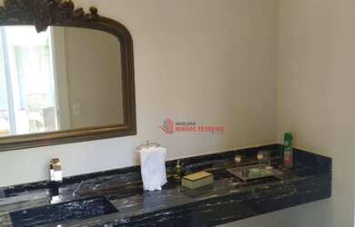 Imagem: A casa em condomínio possui 4 Dormitórios, 5 Banheiros, 5