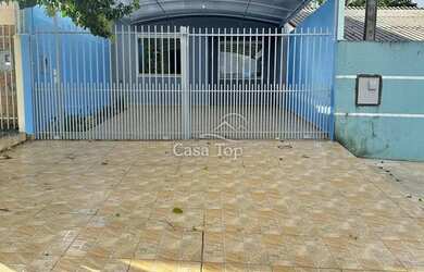 Imagem: A casa possui 2 Dormitórios, 2 Banheiros, 2 Vagas na garagem