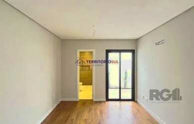 Imagem 15: Casa em Porto Alegre, no bairro Hípica, com 3 dormitório s , e 3 banheiros,...