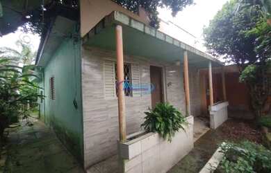 Imagem: A casa possui 2 Dormitórios, 2 Banheiros e 1 Vaga na garagem