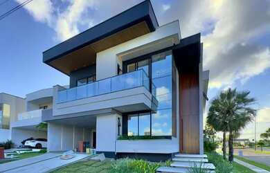 Imagem: A casa em condomínio possui 4 Dormitórios, 5 Banheiros, 4