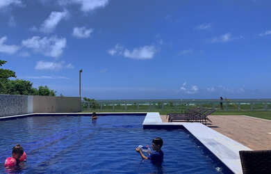 Imagem: A casa possui 5 Dormitórios, 2 Vagas na garagem e está localizado