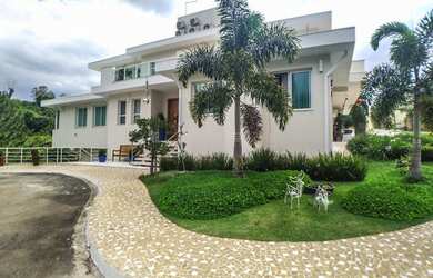 Imagem: A casa em condomínio possui 5 Dormitórios, 5 Banheiros, 4