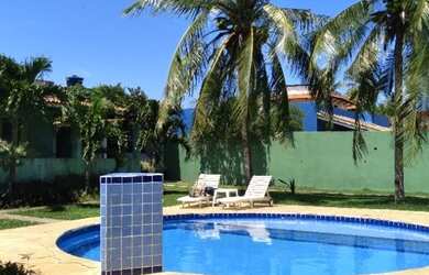 Imagem: A casa possui 4 Dormitórios, 5 Vagas na garagem e está localizado