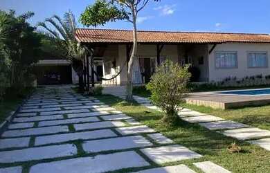 Imagem: A casa possui 5 Dormitórios, 5 Banheiros, 5 Vagas na garagem