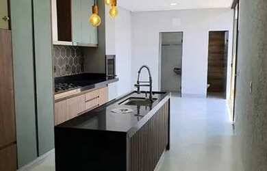 Imagem: A casa possui 3 Dormitórios, 3 Banheiros, 3 Vagas na garagem