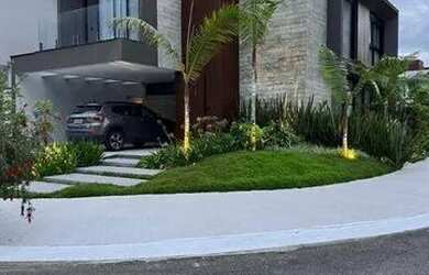 Imagem: A casa possui 3 Dormitórios, 5 Banheiros, 4 Vagas na garagem