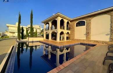 Imagem: A casa em condomínio possui 3 Dormitórios, 4 Banheiros, 4