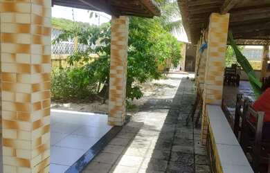 Imagem: A casa possui 5 Dormitórios, 5 Banheiros, 5 Vagas na garagem