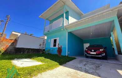 Imagem: A casa possui 3 Dormitórios, 1 Banheiro, 1 Vaga na garagem