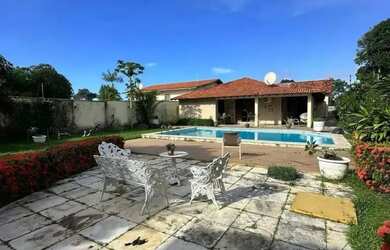 Imagem: A casa possui 5 Dormitórios, 5 Banheiros, 4 Vagas na garagem