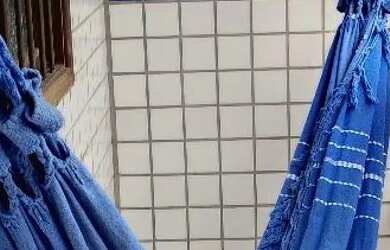 Imagem: A casa possui 2 Dormitórios, Acomodam 6 pessoas, 1 Vaga na