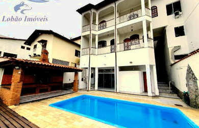 Imagem: A casa possui 4 Dormitórios, 5 Banheiros, 2 Vagas na garagem