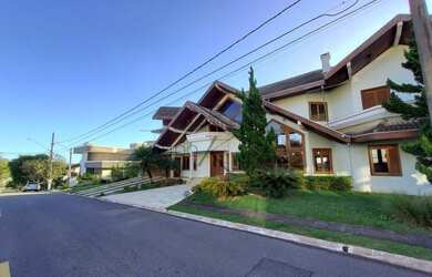 Imagem: A casa em condomínio possui 5 Dormitórios, 5 Banheiros, 5