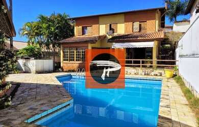 Imagem: A casa em condomínio possui 4 Dormitórios, 4 Banheiros, 5