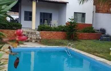 Imagem: A casa possui 4 Dormitórios, 4 Banheiros, 4 Vagas na garagem