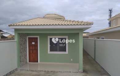 Imagem: A casa possui 2 Dormitórios, 1 Banheiro, 1 Vaga na garagem