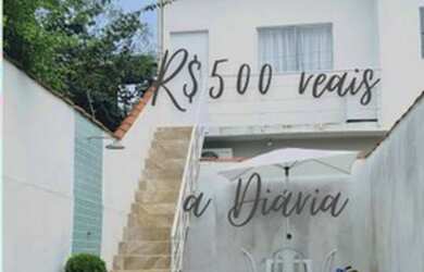 Imagem: A casa possui 2 Dormitórios, 2 Vagas na garagem e está localizado