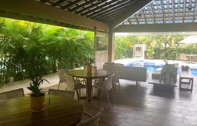 Imagem: A casa possui 5 Dormitórios, 5 Banheiros, 4 Vagas na garagem