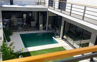 Imagem: A casa em condomínio possui 4 Dormitórios, 5 Banheiros, 4