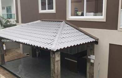 Imagem: A casa possui 5 Dormitórios, 5 Banheiros, 4 Vagas na garagem