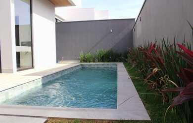 Imagem: A casa em condomínio possui 4 Dormitórios, 5 Banheiros, 2