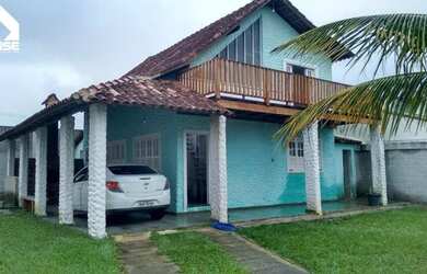 Imagem: A casa possui 4 Dormitórios, 3 Banheiros, 5 Vagas na garagem