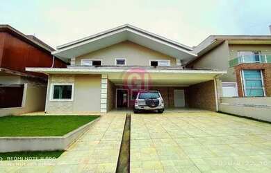 Imagem: A casa possui 3 Dormitórios, 4 Banheiros, 4 Vagas na garagem