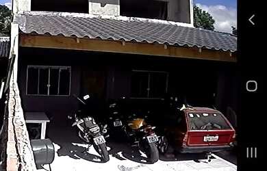 Imagem: A casa possui 3 Dormitórios, 3 Banheiros, 5 Vagas na garagem