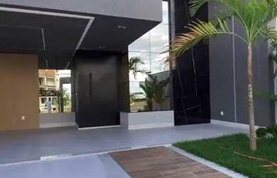 Imagem: A casa possui 4 Dormitórios, 5 Banheiros, 4 Vagas na garagem