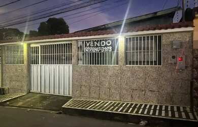 Imagem: Vende-se um tereno com duas casa.