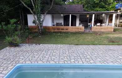 Imagem: A casa possui 2 Dormitórios, 2 Banheiros, 5 Vagas na garagem