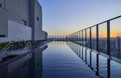 Imagem: O apartamento possui 4 Dormitórios, 5 Banheiros, 4 Vagas na