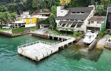 Imagem 6: Casa costeira com praia de 8 suítes, em Angra dos Reis-RJ