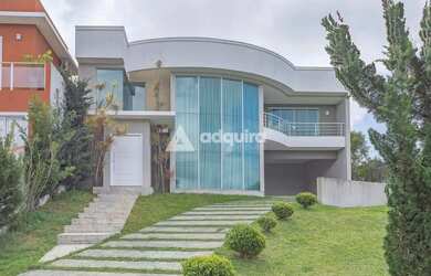 Imagem: A casa em condomínio possui 3 Dormitórios, 4 Banheiros, 2