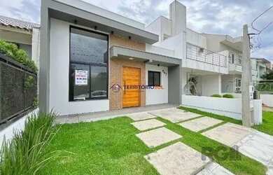 Imagem 2: Casa em Porto Alegre, no bairro Hípica, com 3 dormitório s , e 3 banheiros,...