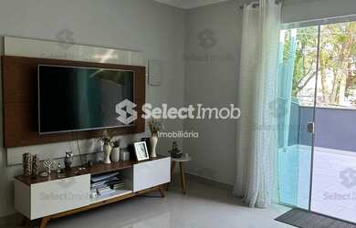 Imagem: A casa possui 3 Dormitórios, 2 Banheiros, 4 Vagas na garagem