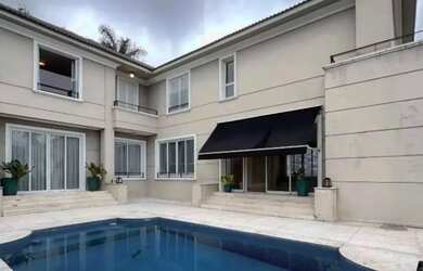 Imagem: A casa em condomínio possui 5 Dormitórios, 5 Banheiros, 4