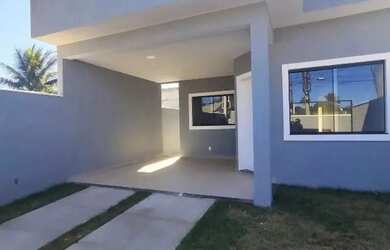 Imagem: A casa possui 3 Dormitórios, 2 Banheiros, 3 Vagas na garagem