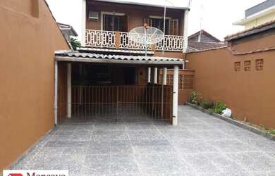 Imagem: A casa possui 2 Dormitórios, 1 Banheiro, 5 Vagas na garagem